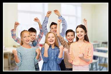 Students in a classroom with their arms raised